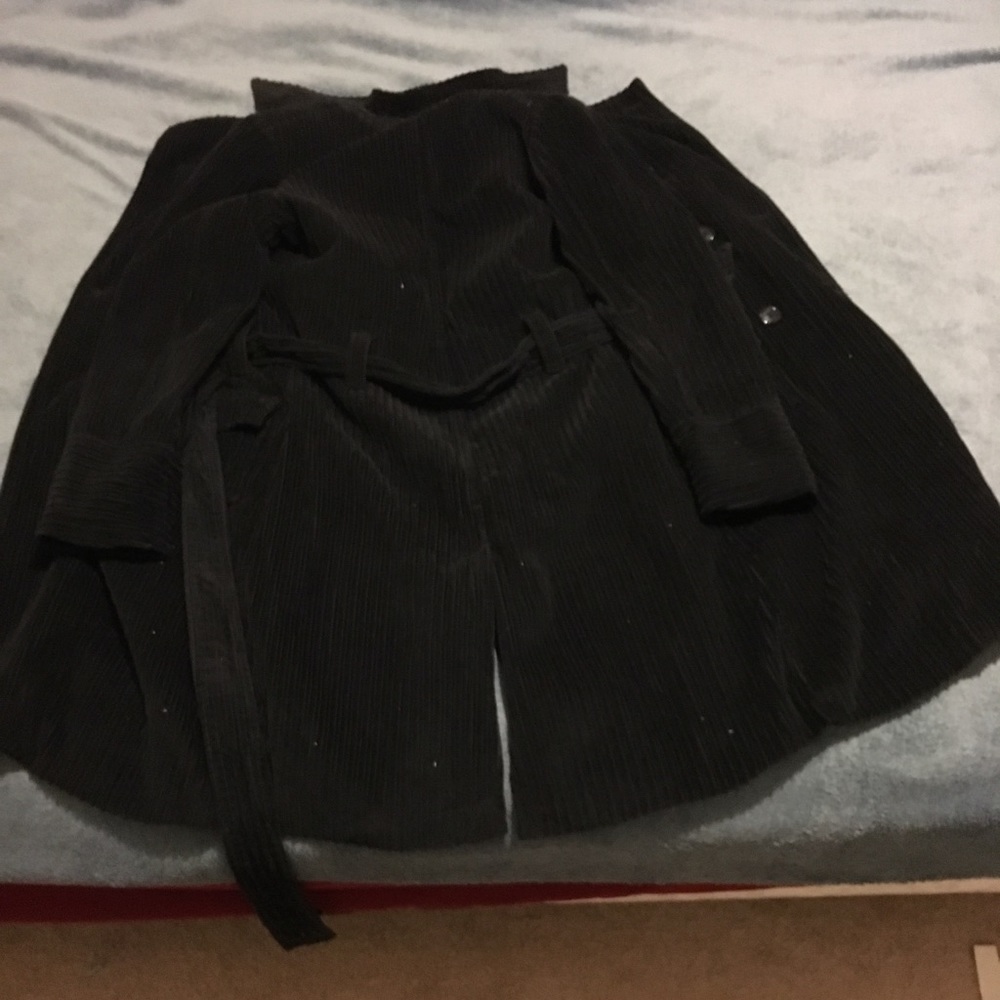 Black, warm, medium sized jacket